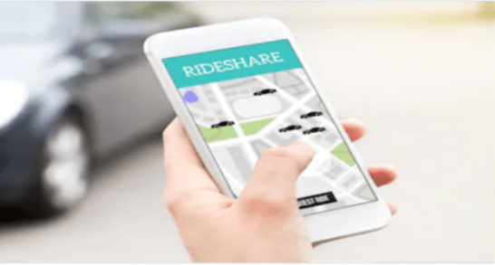 Ride-share taxi service on the smartphone screen.