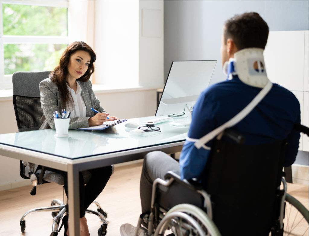 A car accident victim consulting with an attorney