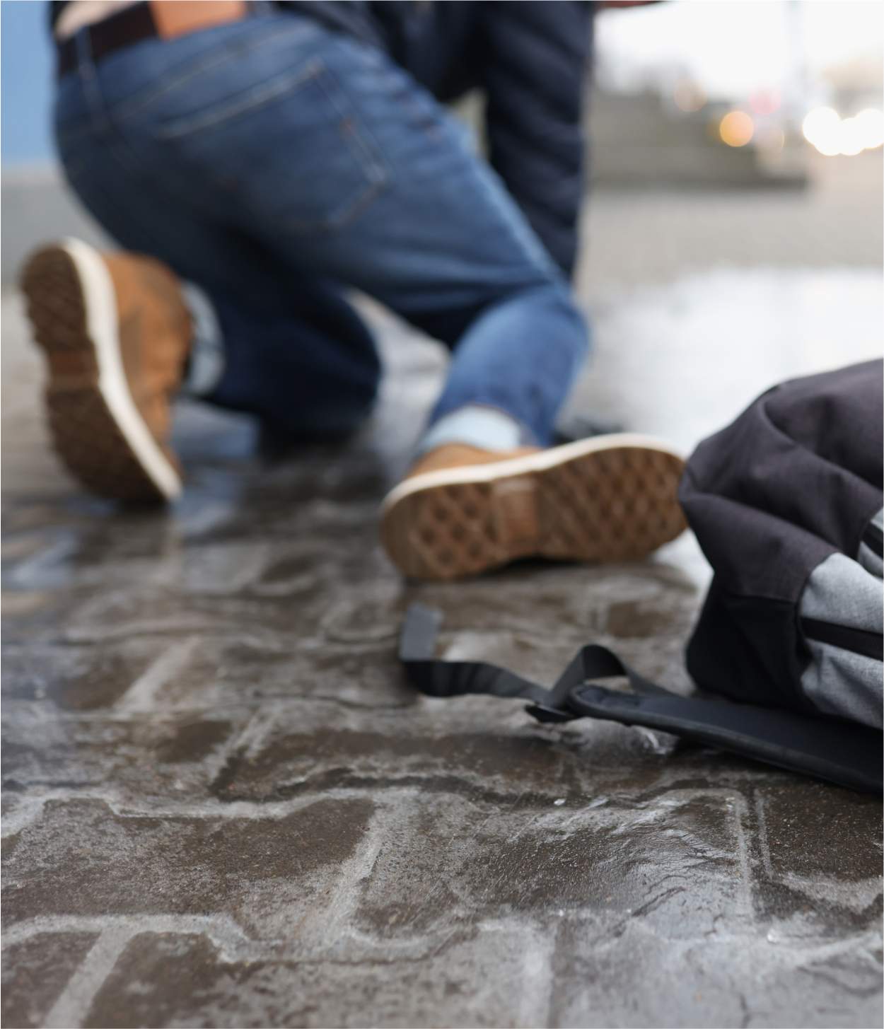 A hurt person on the ground after falling